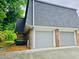 Attached two car garage offering convenience and additional storage space at 1128 Hampton Way, Atlanta, GA 30324