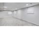 Spacious finished basement featuring neutral carpet, white walls, and recessed lighting at 2142 Troutdale Dr, Decatur, GA 30032