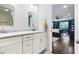 Bathroom with a marble-topped vanity and view into the blue bedroom at 2142 Troutdale Dr, Decatur, GA 30032
