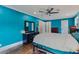 Spacious main bedroom featuring a ceiling fan and hardwood floors at 2142 Troutdale Dr, Decatur, GA 30032