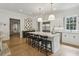 Large kitchen features a center island with breakfast bar, stainless appliances, and custom cabinetry at 2671 Bohler Nw Rd, Atlanta, GA 30327