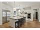 Gourmet kitchen boasts stainless steel appliances, a large center island, and custom cabinetry at 2671 Bohler Nw Rd, Atlanta, GA 30327
