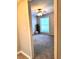 Bedroom with carpet, ceiling fan, and large window at 3160 Seven Pines Unit 105 Ct, Atlanta, GA 30339
