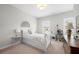 Cozy bedroom with neutral tones, a twin bed, and plenty of natural light at 402 Retreat Ln, Canton, GA 30114