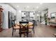 Open-concept design showcasing the kitchen, dining area, and staircase at 402 Retreat Ln, Canton, GA 30114