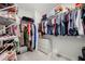 Organized walk-in closet with ample storage and shelving at 402 Retreat Ln, Canton, GA 30114