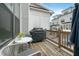 Relaxing outdoor balcony area with seating and grill perfect for entertaining at 414 Concord St, Alpharetta, GA 30009