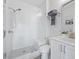 Modern bathroom with glass-enclosed shower, subway tile, and updated fixtures at 414 Concord St, Alpharetta, GA 30009