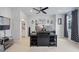 Comfortable bedroom featuring a desk, ceiling fan, and bright window at 414 Concord St, Alpharetta, GA 30009