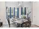 Elegant dining room featuring a modern light fixture and seating for six at 414 Concord St, Alpharetta, GA 30009