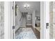 Bright foyer showcasing staircase, stylish rug, and inviting decor at 414 Concord St, Alpharetta, GA 30009