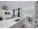 Open kitchen featuring stainless steel appliances, a large island, and seamless flow into the breakfast nook and living area at 414 Concord St, Alpharetta, GA 30009