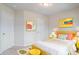 Cozy bedroom with colorful decor and comfortable furnishings at 235 Orchard Dr, Covington, GA 30014