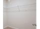 Walk-in closet space with a wire shelf at 235 Orchard Dr, Covington, GA 30014