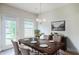 Elegant dining room featuring hardwood floors and refined decor at 235 Orchard Dr, Covington, GA 30014