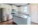 Modern kitchen featuring stainless steel appliances and granite countertops at 235 Orchard Dr, Covington, GA 30014