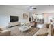 Inviting living room with stylish decor, open to a modern kitchen at 235 Orchard Dr, Covington, GA 30014
