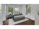 Bright bedroom filled with natural light with a large window with a window seat, and built-in storage at 8 Collier Nw Rd # B2, Atlanta, GA 30309