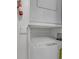 This laundry room has white appliances at 8 Collier Nw Rd # B2, Atlanta, GA 30309