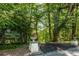 Entrance to Tanyard Creek Park with signage and lush greenery, a peaceful retreat for nature enthusiasts at 8 Collier Nw Rd # B2, Atlanta, GA 30309