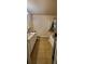 Neutral bathroom features a shower-tub combo and long vanity with white cabinets at 1788 Arbor Gate Dr # 1505, Lawrenceville, GA 30044
