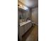 Bathroom with a double vanity, tile flooring, large mirror, and walk-in shower at 1788 Arbor Gate Dr # 1505, Lawrenceville, GA 30044