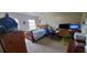 Bedroom features two windows, a TV, and work desk space at 1788 Arbor Gate Dr # 1505, Lawrenceville, GA 30044