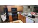 Well-equipped kitchen boasting stainless steel appliances and ample cabinet space at 1788 Arbor Gate Dr # 1505, Lawrenceville, GA 30044