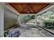 Covered patio with stone flooring and view of the backyard at 205 Camden Creek Ct, Lawrenceville, GA 30043