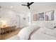 Bright bedroom featuring a plush bed, playful wall art, and a sunlit desk area for a -friendly space at 2297 Nesbitt Ne Dr, Brookhaven, GA 30319