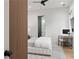 Comfortable bedroom with natural light, a desk, and minimalist decor at 2297 Nesbitt Ne Dr, Brookhaven, GA 30319