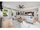 Expansive living room showcasing a modern aesthetic with a neutral color palette at 2297 Nesbitt Ne Dr, Brookhaven, GA 30319