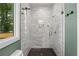 Bright shower with glass door, rain shower head and sleek, modern fixtures at 2297 Nesbitt Ne Dr, Brookhaven, GA 30319