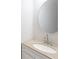 Elegant bathroom featuring a stylish sink with vanity and modern fixtures at 4271 Brighton Nw Way, Kennesaw, GA 30144