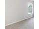 Bright bedroom featuring neutral carpet and a window providing natural light at 4271 Brighton Nw Way, Kennesaw, GA 30144