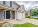 Attractive home exterior with well-maintained lawn, brick accents, and two-car garage at 4271 Brighton Nw Way, Kennesaw, GA 30144