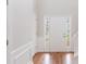 Welcoming foyer with white wainscoting and hardwood floors, leading to the main living areas at 4271 Brighton Nw Way, Kennesaw, GA 30144