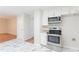 Well-equipped kitchen with stainless steel appliances and marble floors at 4271 Brighton Nw Way, Kennesaw, GA 30144