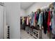 Organized walk-in closet with plenty of hanging space and shelving for shoes and storage at 437 Autrey Dr, Douglasville, GA 30134
