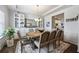 Elegant dining room with classic decor, built-in cabinets, and ample natural light at 437 Autrey Dr, Douglasville, GA 30134
