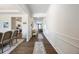 Spacious entryway with hardwood floors and elegant wainscoting, leading to the living areas at 437 Autrey Dr, Douglasville, GA 30134