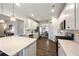 Modern kitchen with white cabinetry, stainless steel appliances, and a spacious island with seating at 437 Autrey Dr, Douglasville, GA 30134