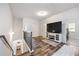 Upstairs loft features a large television and room for relaxing at 437 Autrey Dr, Douglasville, GA 30134