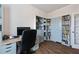 Cozy home office with built-in bookshelves and a comfortable workspace at 437 Autrey Dr, Douglasville, GA 30134
