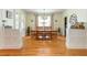 Elegant dining room featuring hardwood floors, large windows, and ample seating for Gathering gatherings at 177 Ridgeland Ave, Decatur, GA 30030