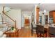 Spacious entryway leading to an open floor plan, showcasing hardwood floors and a staircase at 177 Ridgeland Ave, Decatur, GA 30030