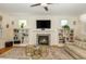 Cozy living room showcasing built-in bookshelves, fireplace, and neutral tones, creating a welcoming atmosphere at 177 Ridgeland Ave, Decatur, GA 30030