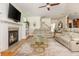 Inviting living area with fireplace, comfortable seating, and an open layout, ideal for relaxing and entertaining at 177 Ridgeland Ave, Decatur, GA 30030