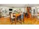 Open floor plan with hardwood floors, combining living, dining, and kitchen areas for easy living at 177 Ridgeland Ave, Decatur, GA 30030
