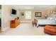 Spacious main bedroom featuring neutral tones, large window, and stylish furnishings to create a relaxing retreat at 177 Ridgeland Ave, Decatur, GA 30030